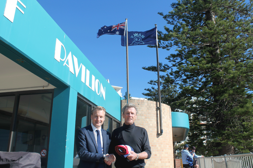 James Griffin presents NSW flag to Manly LSC